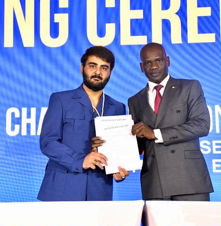 Mr. Nikhil Chandra, Chairman of Odhav Multi Industries, signing a contract with Mr. GUIBOLO FANGA Mathieu, Minister of Commerce and Industry of Chad.